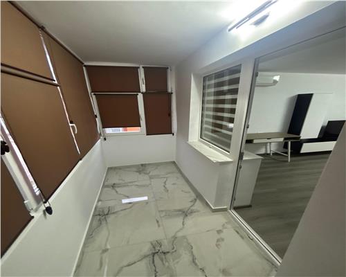 Garsoniera ultracentrala, prima închiriere, totul nou – langa Piata Civica